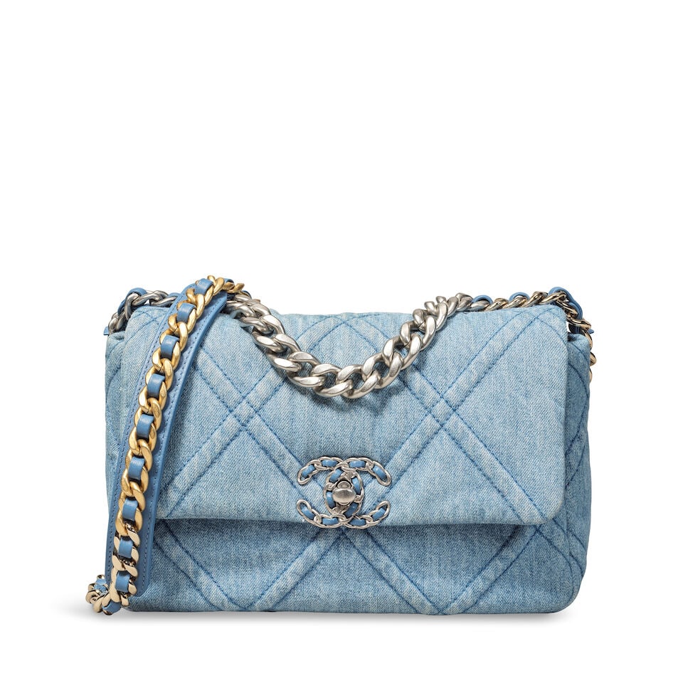 Chanel: a Medium Denim 19 Flap Spring 2022 (includes microchip, booklet, dust bag and box, and n...: Chanel: a Medium Denim 19 Flap Spring 2022 Creative Director: Virginie Viard Quilted blue denim with gold and silver tone hardware, chain link top handle and shoulder strap, grosgrain lined interior w