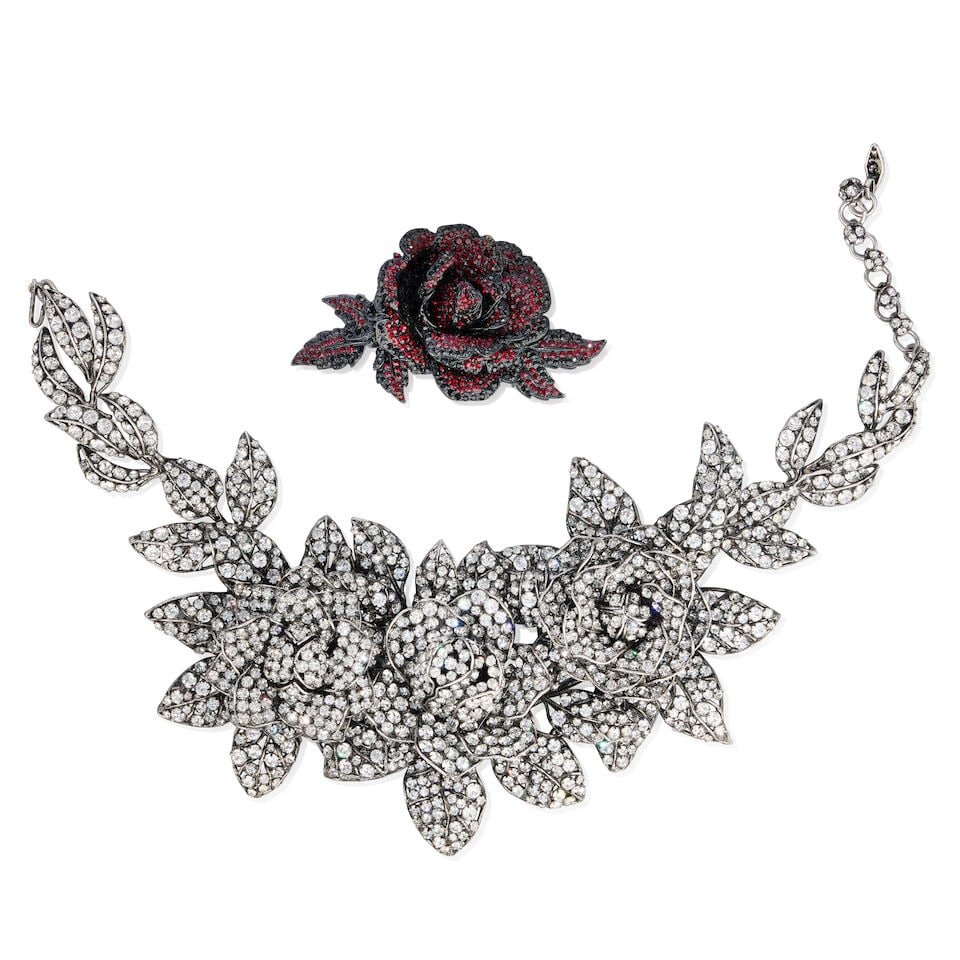 Iradj Moini and Barrera: a Floral Collar and Brooch 1990s: Iradj Moini and Barrera: a Floral Collar and Brooch 1990s Dramatic Iradj Moini crystal floral collar with trembleuse effect, 23cm drop, together with a Barrera red crystal floral brooch, pin backing, 