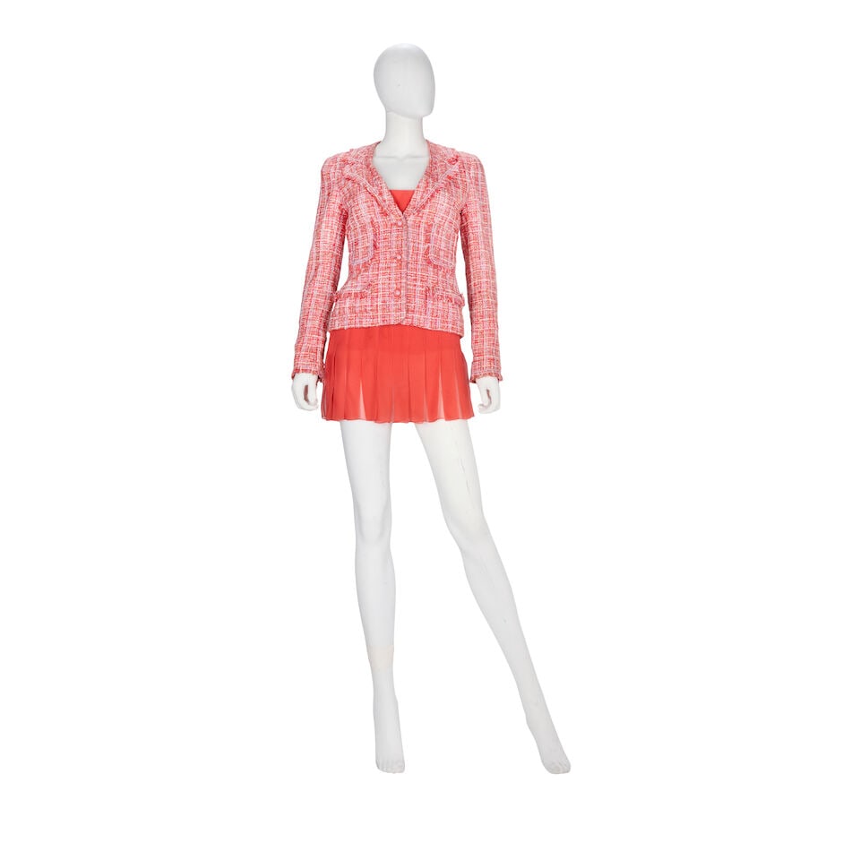 Chanel: a Coral Tweed Blazer and Pleated Silk Skirt Spring 2004: Chanel: a Coral Tweed Blazer and Pleated Silk Skirt Spring 2004 Creative Director: Karl Lagerfeld The blazer in shades of coral, pastel purple and pink, with clear resin and pink CC buttons, the skirt