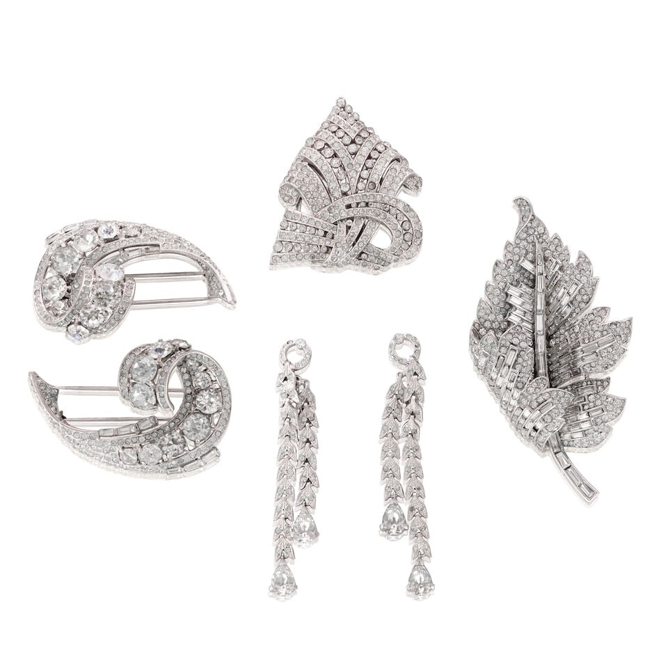 Trifari: a Collection of Silver Tone Costume Jewellery: Trifari: a Collection of Silver Tone Costume Jewellery To include an Art Deco crystal dress clip, 1937, inscribed patent no: 107142, two Sterling silver swirl fur pins, inscribed 'pat pend', c.1947, a