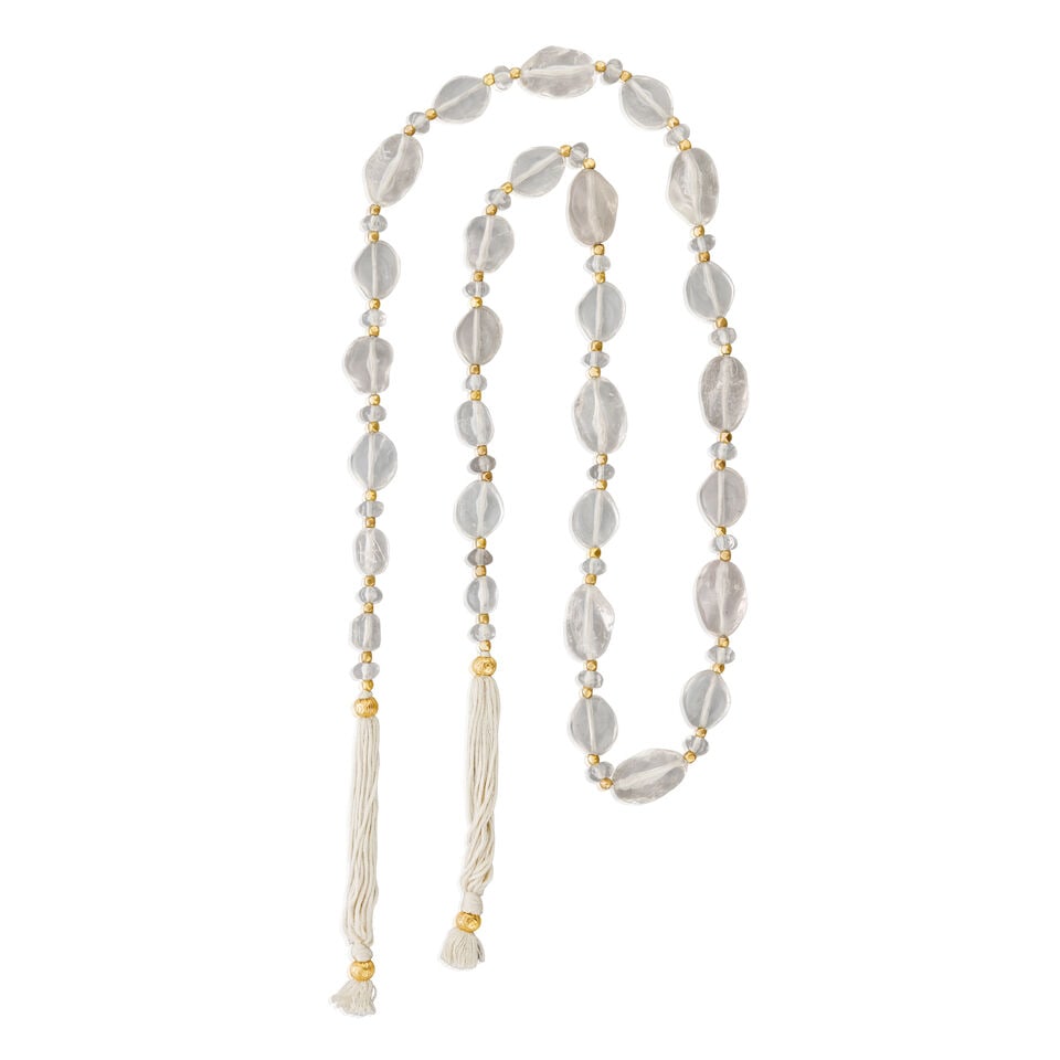 Chanel: a Clear Resin Beads and Tassel Necklace Spring 1999: Chanel: a Clear Resin Beads and Tassel Necklace Spring 1999 Creative Director: Karl Lagerfeld Irregular quartz-like resin beads with silk tassel to both ends, gold tone hardware Condition Grade B- Ove