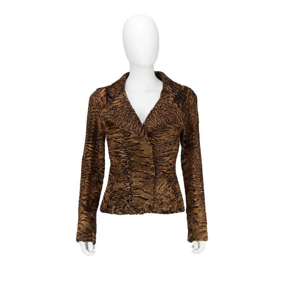 Loewe: a Brown Swakara Astrakhan Jacket: Loewe: a Brown Swakara Astrakhan Jacket Glossy two-tone astrakhan fur, wide collar and hidden fastening at the waist Condition Grade A Labelled size 38 For further information on this lot please visit