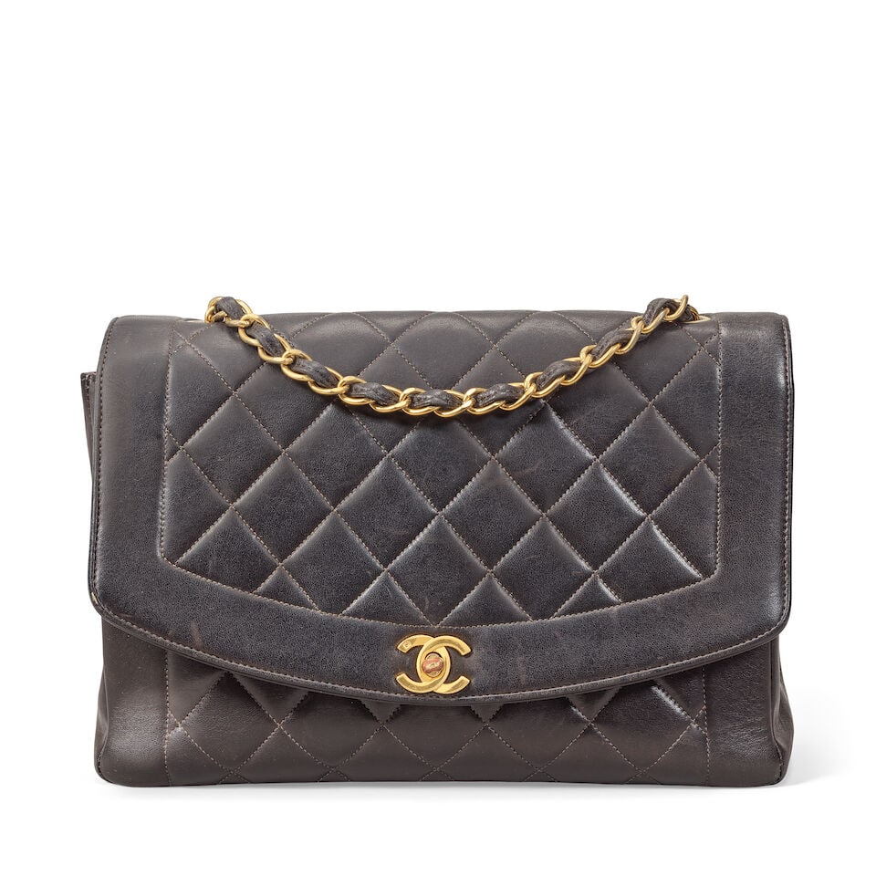 Chanel: a Large Dark Brown Lambskin Diana Flap Bag 1990s (date code worn) (includes dust bag) (1 of 2)