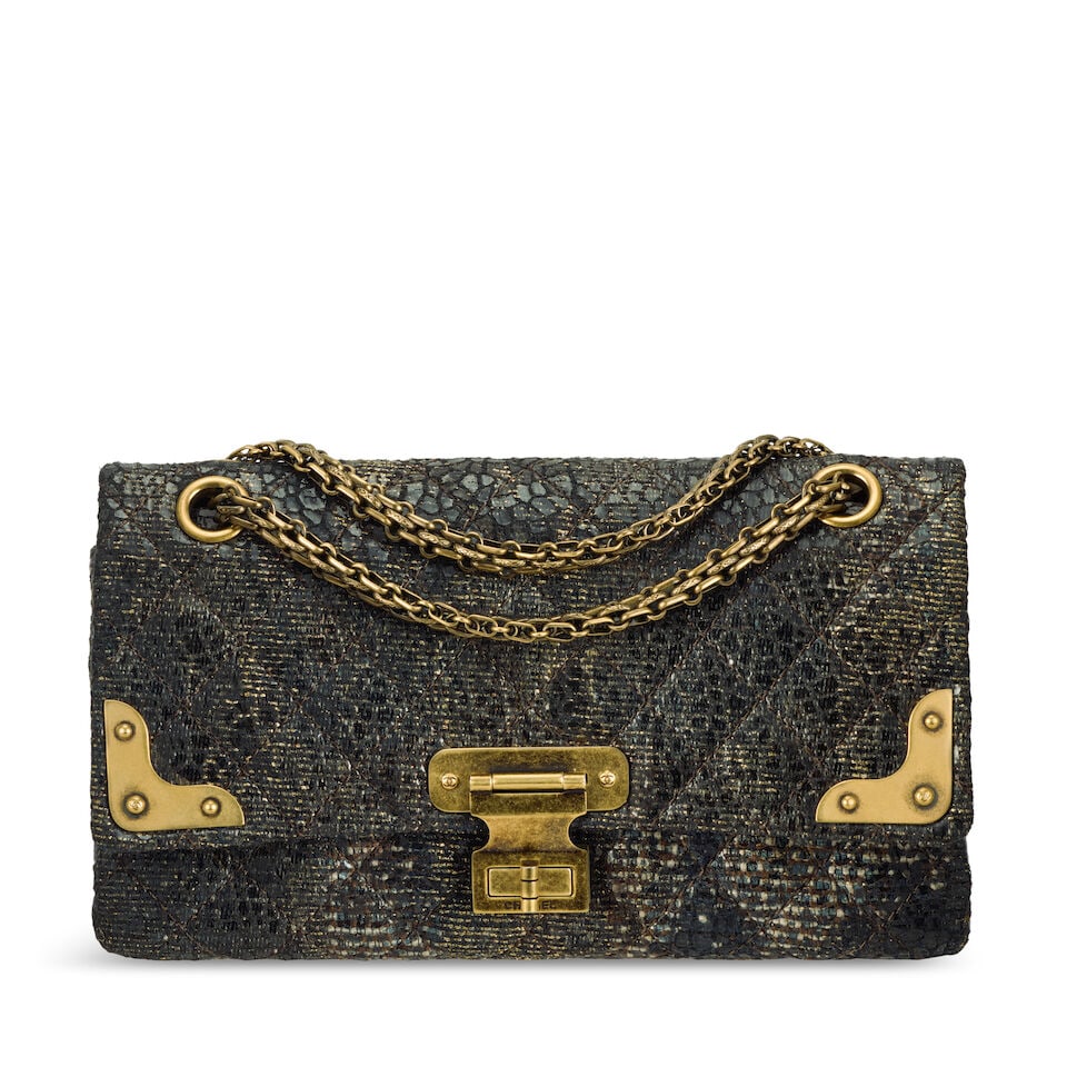 Chanel: a Lacquered Tweed Reissue Flap Paris-Shanghai Collection, Pre-Fall 2010, Runway Look 18 ...: Chanel: a Lacquered Tweed Reissue Flap Paris-Shanghai Collection, Pre-Fall 2010, Runway Look 18 Creative Director: Karl Lagerfeld Metallic glazed brown and gold quilted tweed featuring antiqued gold t