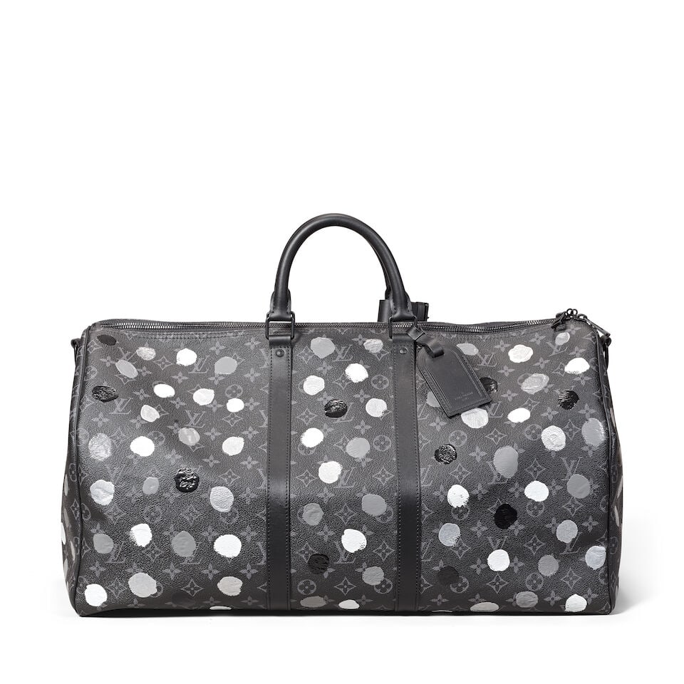 Louis Vuitton x Yayoi Kusama: a Dots Infinity Monogram Eclipse Keepall Bandoulière 50 2023 ...: Louis Vuitton x Yayoi Kusama: a Dots Infinity Monogram Eclipse Keepall Bandoulière 50 2023 Grey monogram with greyscale 'paint splash' design, black hardware and black leather trim and shoulder s