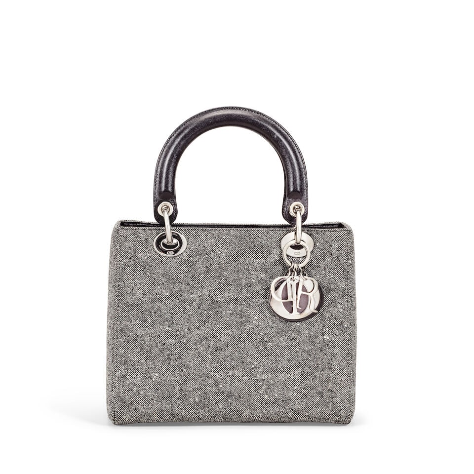 Christian Dior: a Grey Fabric Medium Lady Dior 1998 (includes authenticity card, booklet and dus...: Christian Dior: a Grey Fabric Medium Lady Dior 1998 Creative Director: John Galliano Speckled grey wool body with smooth black leather trim and handles, gunmetal hardware Condition Grade A- 24cm wide,