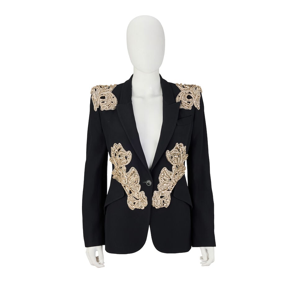 Alexander McQueen: a Black Embroidered Jacket c. 2018 (includes garment bag): Alexander McQueen: a Black Embroidered Jacket c. 2018 Creative Director: Sarah Burton Black jacket with crystal and silver bullion embroidered designs on the shoulders and waist, silk lined Condition 