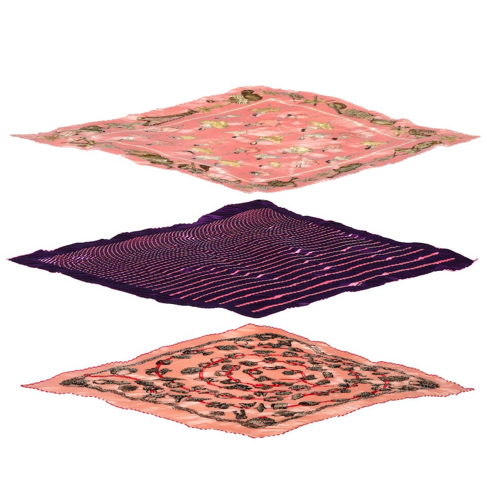 Hermès: Three Silk Plissé Scarves (includes boxes): Hermès: Three Silk Plissé Scarves To include an 'Alliances du Monde' example designed in 2005 by Annie Faivre on pink ground, a purple and pink striped example, and a 'La Danse' example by J