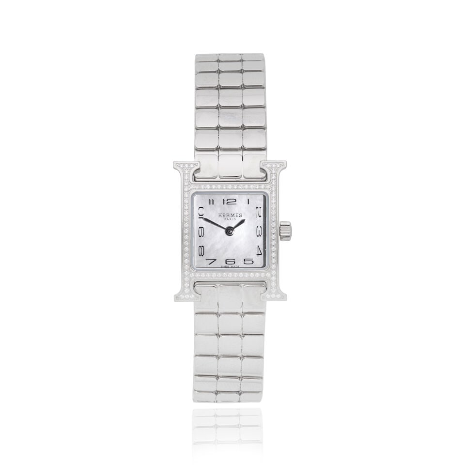 Hermès: a Diamond-Set Stainless Steel Heure H Bracelet Watch Mini model (Ref: 1.131), purch...: Hermès: a Diamond-Set Stainless Steel Heure H Bracelet Watch Mini model (Ref: 1.131), purchased December 2025 Quartz movement, white mother-of-pearl dial, steel bracelet, diamonds approx. 0.175ct