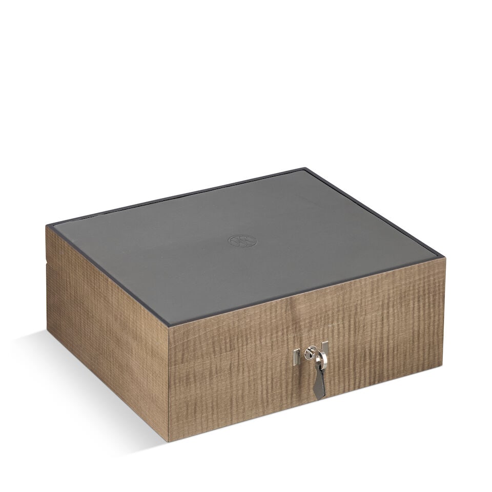 Hermès: a Stained Maple Wood Humidor (includes key): Hermès: a Stained Maple Wood Humidor Grey stained wood with grey Evercolor leather inset lid with tooled logo, silver tone hardware and cedar wood lining with two adjustable dividers, a chrome-ri