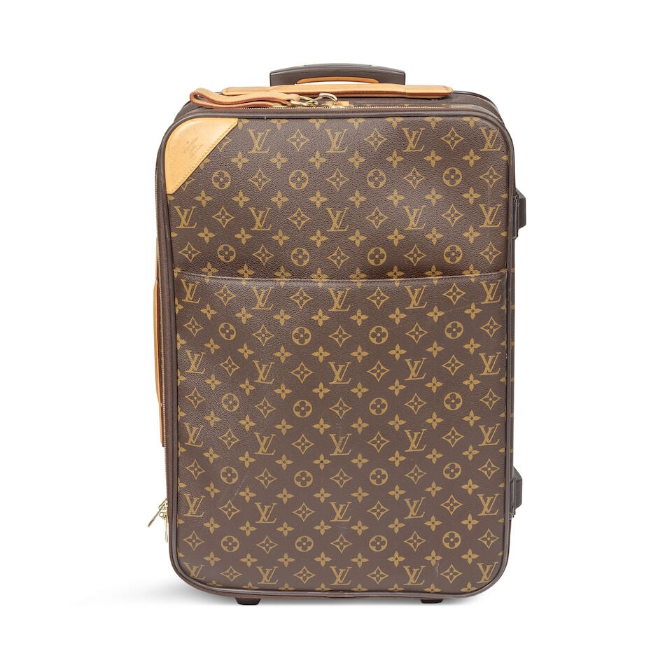 Louis Vuitton: a Monogram Pegase 55 Rolling Suitcase 2004 (includes handle pull and luggage tag): Louis Vuitton: a Monogram Pegase 55 Rolling Suitcase 2004 Creative Director: Marc Jacobs Monogram canvas with vachetta leather trim and gold tone hardware Condition Grade B- 37cm wide, 55cm high, 20cm