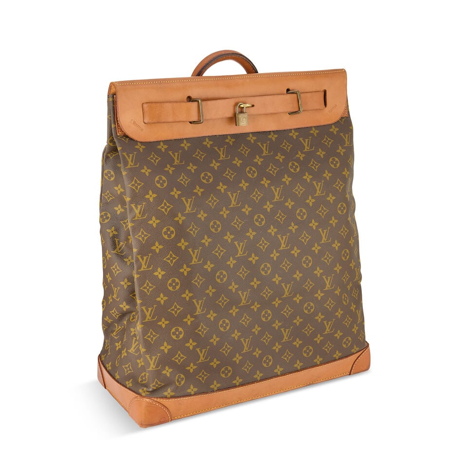 Louis Vuitton: a Monogram Steamer Bag 45 1970s/80s (includes padlock and key): Louis Vuitton: a Monogram Steamer Bag 45 1970s/80s Monogram canvas with leather trim, brass hardware Condition Grade B- 45cm wide, 55cm high, 20cm deep, includes padlock and key For further informatio