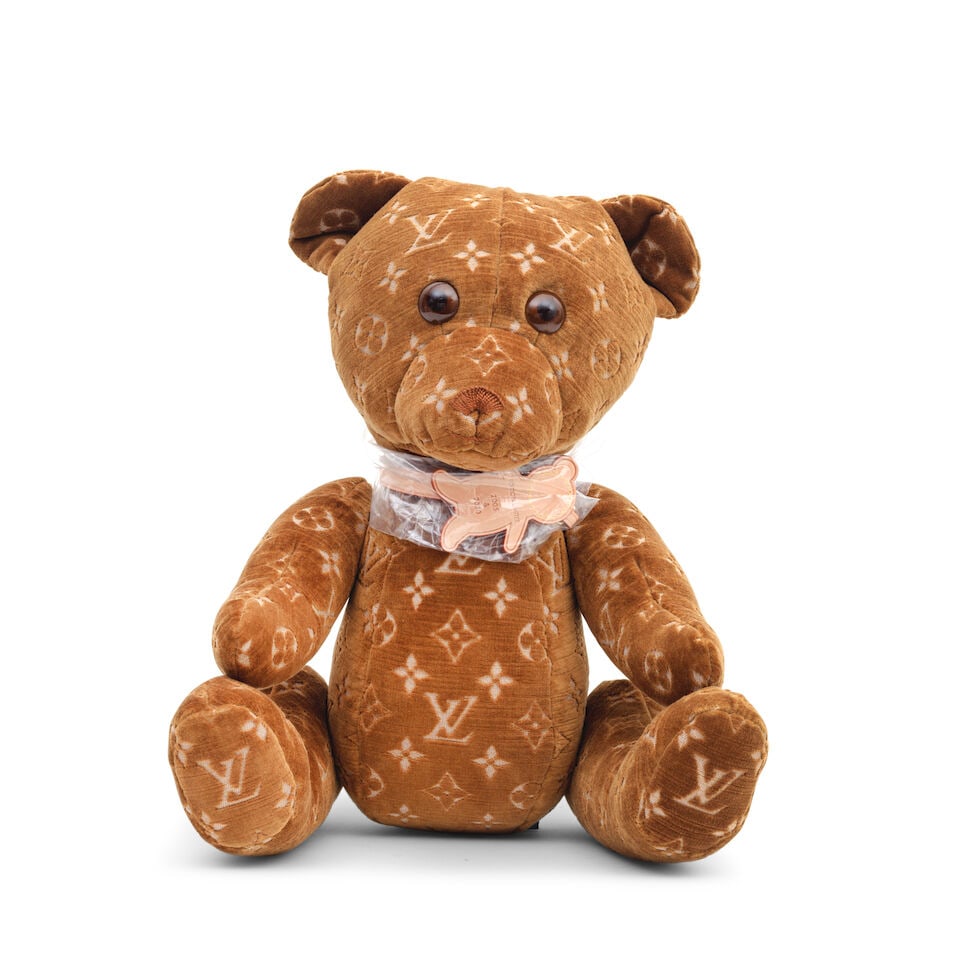 Louis Vuitton: a 2005 & 2020 DouDou Teddy Bear Limited Edition, 2020/21 (includes box): Louis Vuitton: a 2005 & 2020 DouDou Teddy Bear Limited Edition, 2020/21 Monogram velour with tan leather collar Condition Grade A 45cm high, 26cm wide, includes box Footnotes: The DouDou teddy was ori
