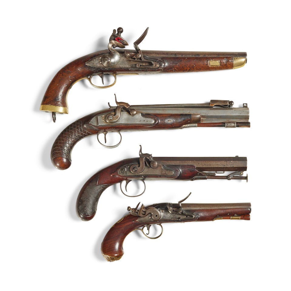 A selection of Four late 18th and 19th century flintlock and percussion holster pistols (1 of 4)