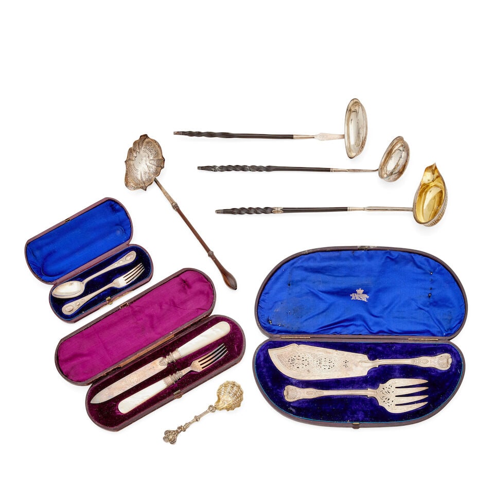 A Victorian set of king's pattern silver fish servers by Francis Higgins II, London, 1870, retai...: A Victorian set of king's pattern silver fish servers by Francis Higgins II, London, 1870, retailed by Hunt & Roskell, Pierced with panels of scrolling foliage, engraved with the crest of Graeme, a Vi