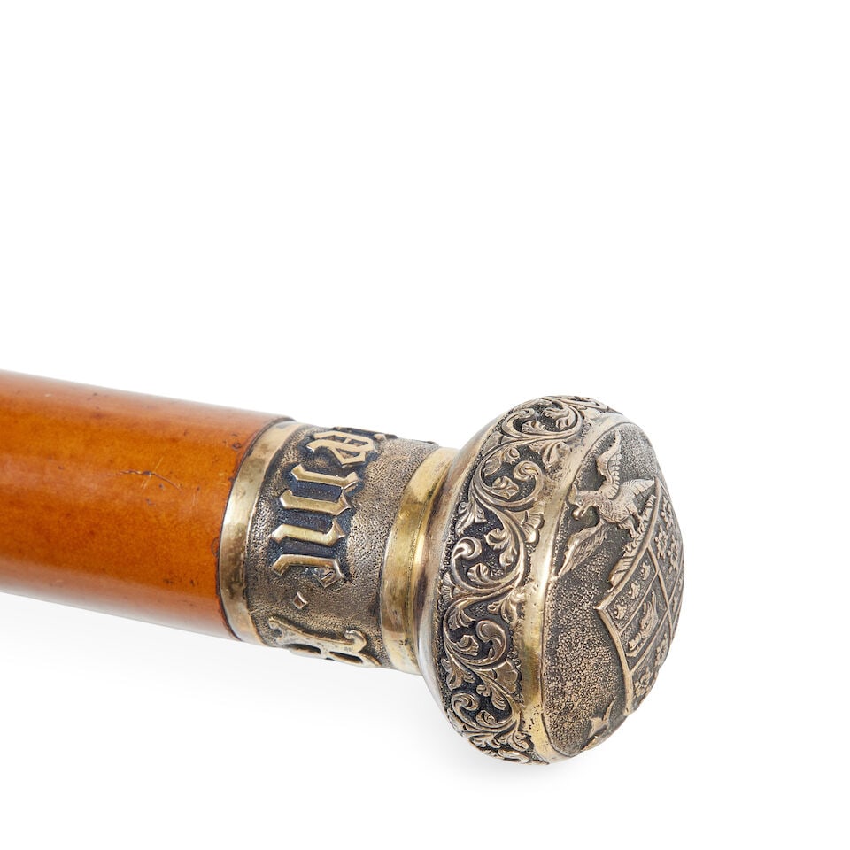 A late 19th century oak and brass bound stick stand and contents (qty) - 2