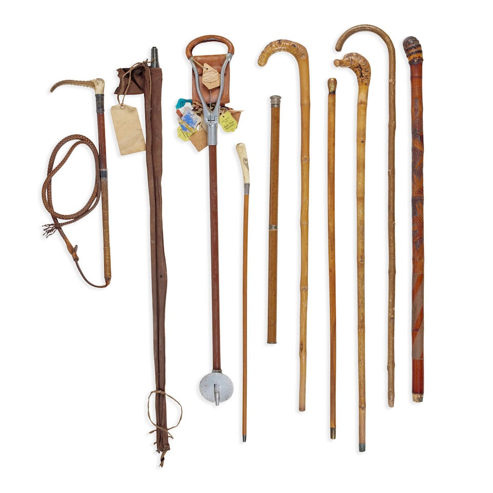 A late 19th century oak and brass bound stick stand and contents (qty) - 5