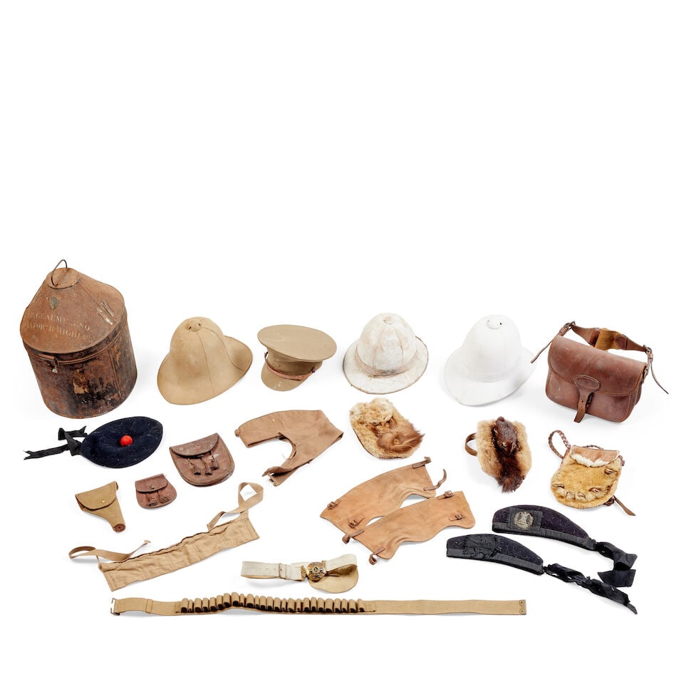 A selection of early 20th century military and other helmets and headgear and other items (1 of 5)