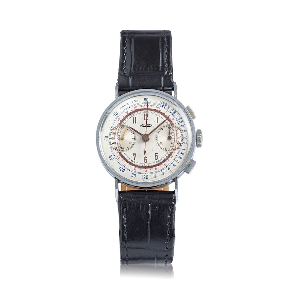 Arches. A stainless steel manual wind chronograph wristwatch Circa 1950: Arches. A stainless steel manual wind chronograph wristwatch Date: Circa 1950 Movement: Jewelled manual wind Dial: Silvered Case: Polished round, No.220861 Strap/Bracelet: Associated non-Arches black 