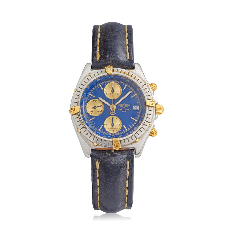 Breitling. A stainless steel and gold automatic chronograph calendar wristwatch Chronomat, Ref:...: Breitling. A stainless steel and gold automatic chronograph calendar wristwatch Model: Chronomat Reference: B13047 Date: Circa 1990 Movement: 17-jewel ETA Cal.7750 automatic Dial: Dark blue Case: