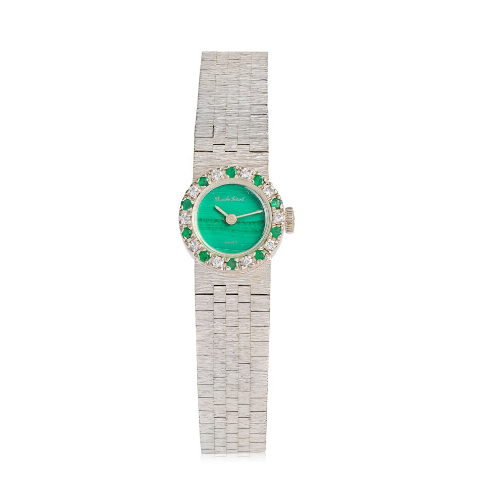 Bueche Girod. A lady's 9K white gold diamond and emerald set manual wind bracelet watch with mal...: Bueche Girod. A lady's 9K white gold diamond and emerald set manual wind bracelet watch with malachite dial Date: London Hallmark for 1970 Movement: 17-jewel manual wind Dial: Malachite Case: Brushed