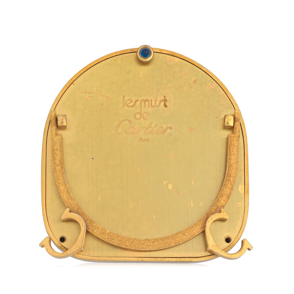 Cartier. A gilt brass manual wind desk clock with alarm and matching photo frame (AF) (2) Ref: 7... - 2