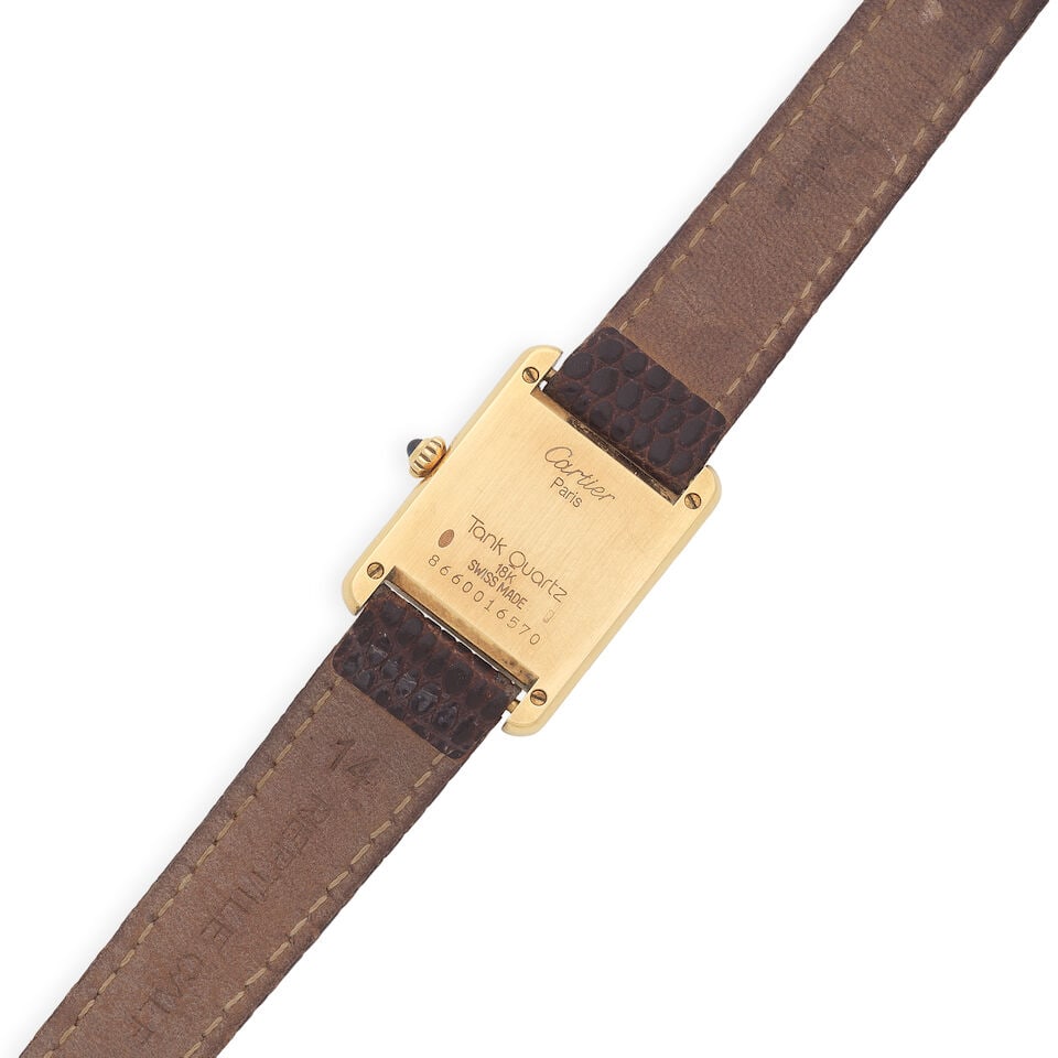 Cartier. An 18K gold quartz wristwatch Tank , Ref: 86600, Purchased 20th December 1989 - 2