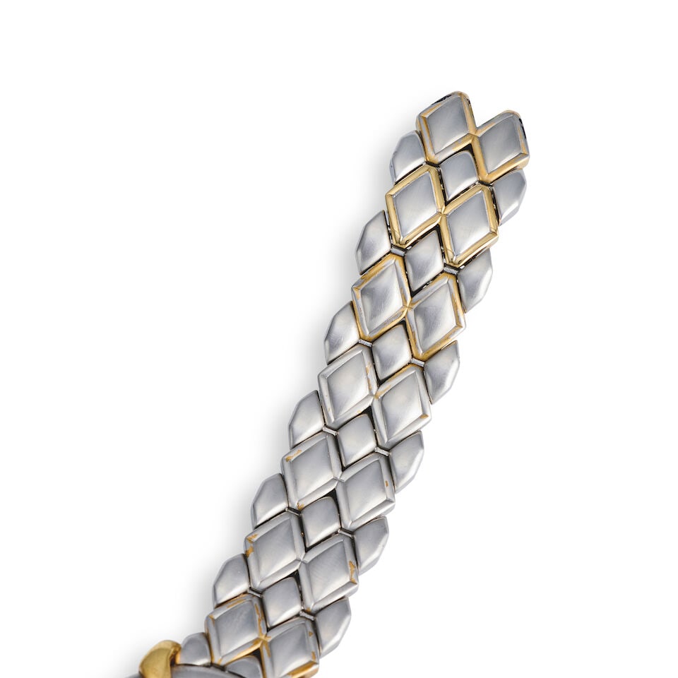 Chaumet. A stainless steel and gold quartz calendar bracelet watch Élysées , Circa 1989 - 2