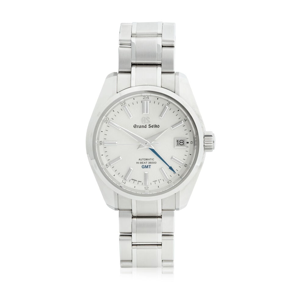 Grand Seiko. A stainless steel automatic calendar bracelet watch with dual time zone Hi-beat GM...