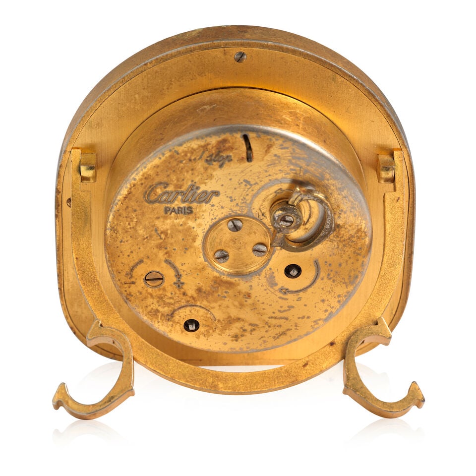 Cartier. A gilt brass manual wind desk clock with alarm Ref: 7504, Circa 1980 - 2