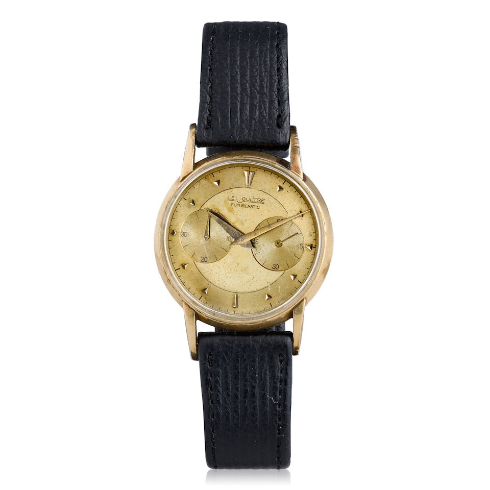 LeCoultre. A gold filled bumper automatic wristwatch with power reserve Futurematic, Circa 1950: LeCoultre. A gold filled bumper automatic wristwatch with power reserve Model: Futurematic Date: Circa 1950 Movement: 17-jewel Cal.497 bumper automatic, No.1087573 Dial: Champagne Case: Polished round