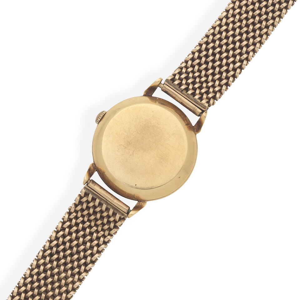 Omega. An 18K gold automatic bracelet watch Circa 1947 - 2