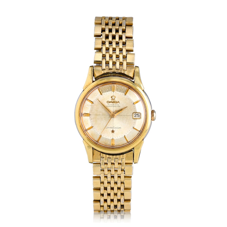 Omega. A gold plated automatic calendar bracelet watch Constellation, Ref: 14393 61 SC, Circa 1961 (1 of 3)