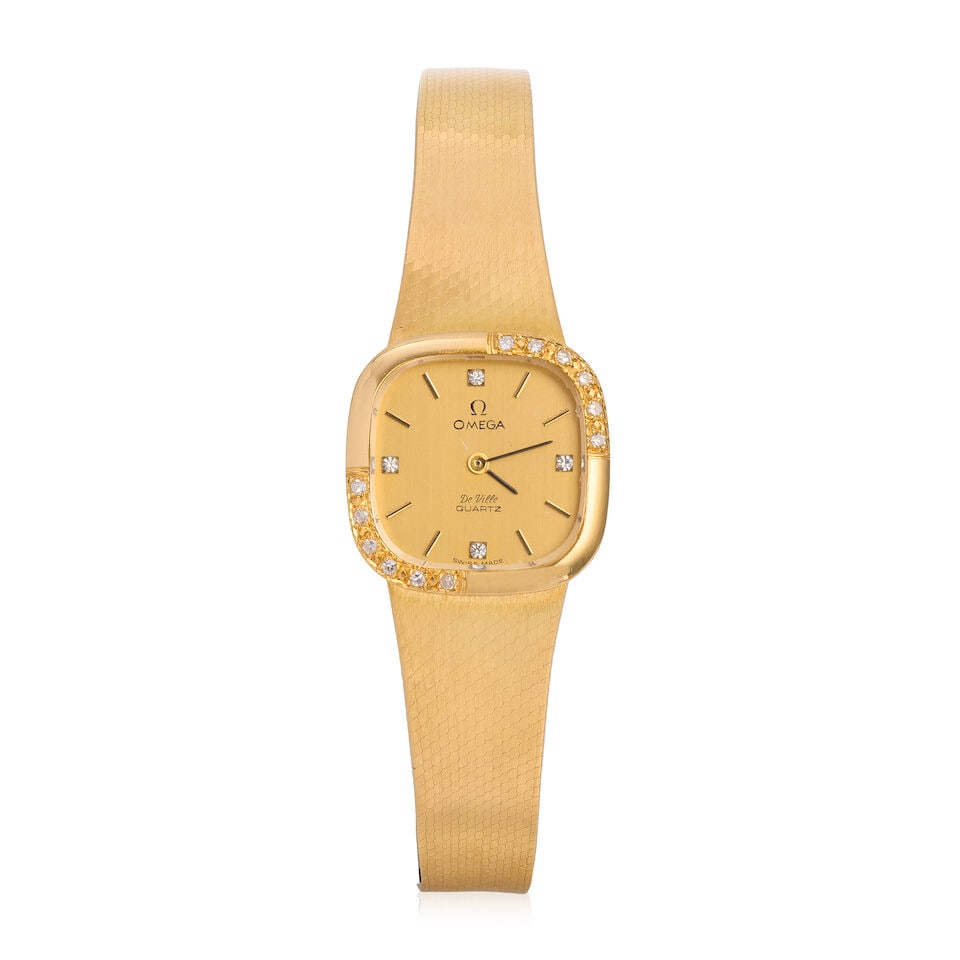 Omega. A lady's 18K gold diamond set quartz bracelet watch De Ville , Circa 1980 (1 of 3)