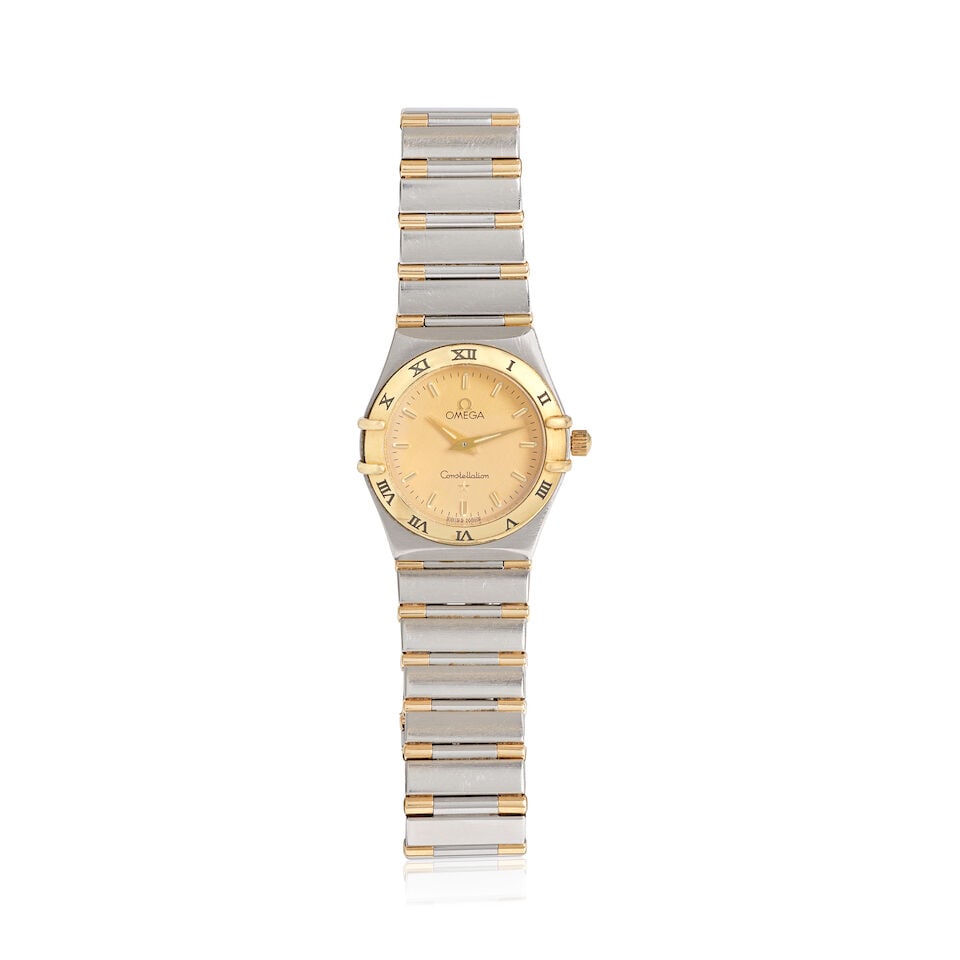 Omega. A lady's stainless steel and gold quartz bracelet watch Constellation, Ref: 795.1202, Ci...: Omega. A lady's stainless steel and gold quartz bracelet watch Model: Constellation Reference: 795.1202 Date: Circa 1995 Movement: 6-jewel Cal.1456 quartz Dial: Textured champagne Case: Brushed and po