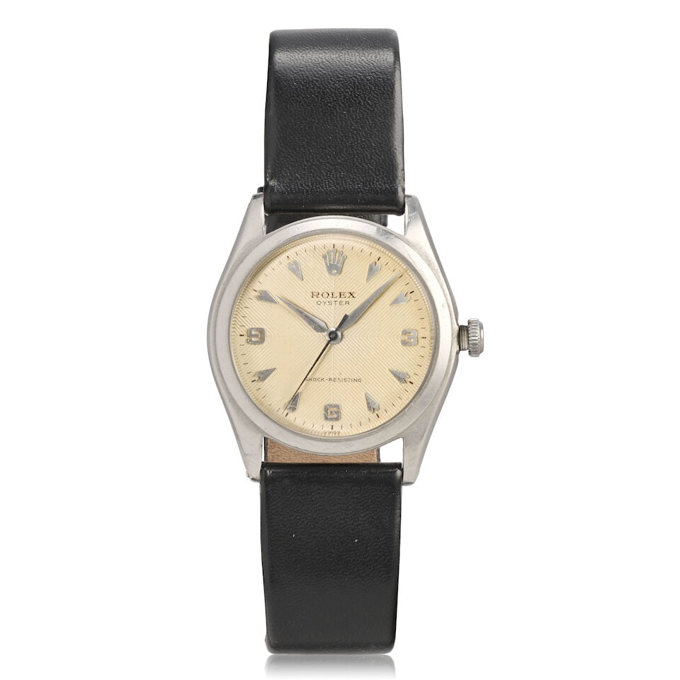 Rolex. A stainless steel manual wind wristwatch Oyster , Ref: 4499, Circa 1946: Rolex. A stainless steel manual wind wristwatch Model: Oyster Reference: 4499 Date: Circa 1946 Movement: 15-jewel manual wind Dial: White chevron textured quarter Case: Polished round,