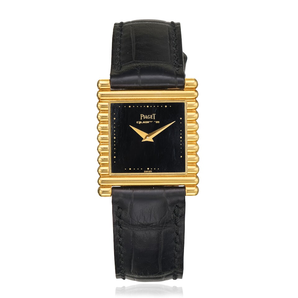 Piaget. An 18K gold quartz wristwatch Ref: 71310, Circa 1980: Piaget. An 18K gold quartz wristwatch Reference: 71310 Date: Circa 1980 Movement: 4-jewel Cal.757P quartz, No.0300450 Dial: Black, gilt dot outer minute divisions, gilt lance hands Case: Brushed and