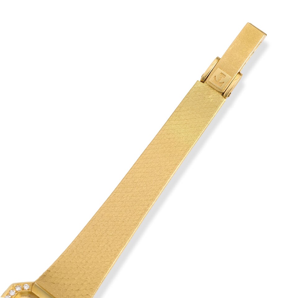 Tissot. A lady's 18K gold and diamond set manual wind bracelet watch London Import mark for 1979 - 2