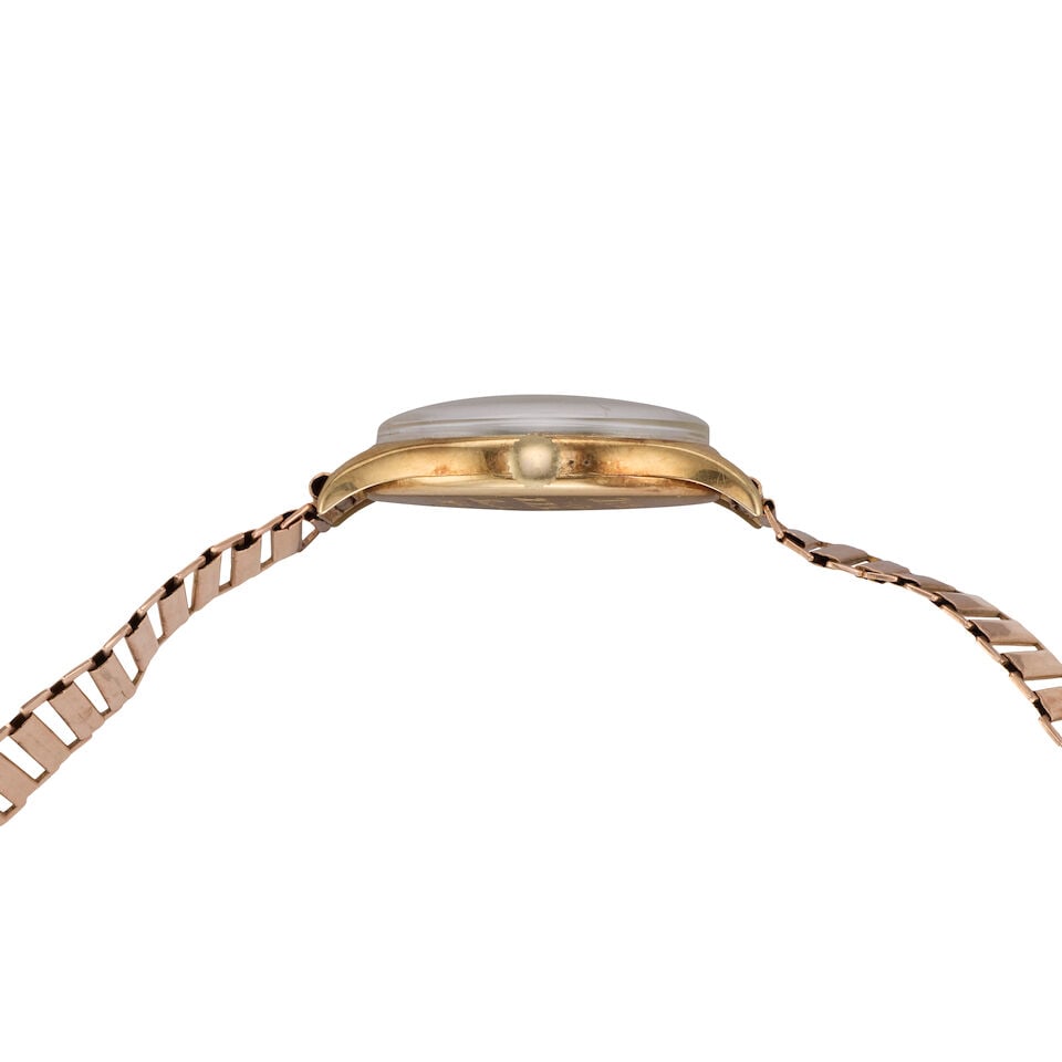 Tissot. A 14K gold manual wind bracelet watch Circa 1940 - 2