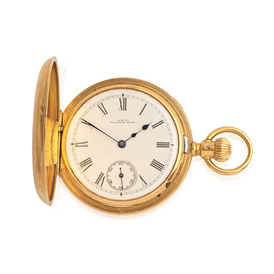 Waltham. An 18K gold keyless wind half hunter pocket watch Circa 1892: Waltham. An 18K gold keyless wind half hunter pocket watch Date: Circa 1892 Movement: Swiss lever, gilt 3/4 plate, No.4683536 Dial: White Case: Polished round, No.17973 Signed: Dial & movement Size: 4