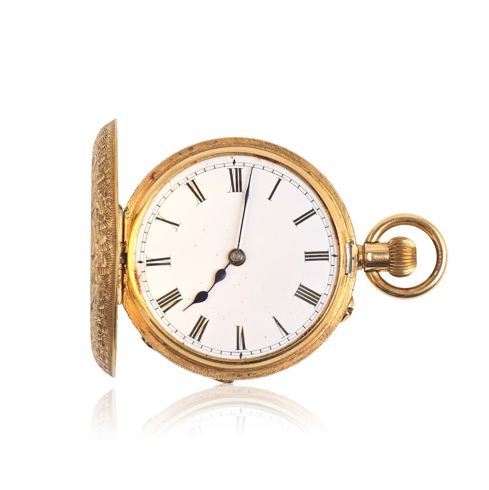 An 18K gold half hunter keyless wind pocket watch Circa 1911: An 18K gold half hunter keyless wind pocket watch Date: Circa 1911 Movement: Gilt 3/4 plate, Swiss lever Dial: White enamel Case: Engraved round, No.37734 Size: 36mm For further information on this lo