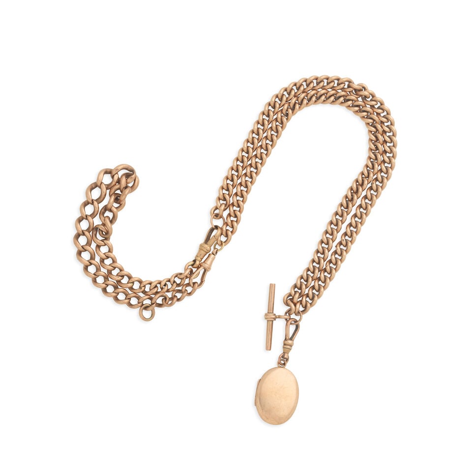 A 9K gold watch chain with pendant Circa 1900: A 9K gold watch chain with pendant Date: Circa 1900 Size: 71cm long Accompaniments: 9K gold pendant For further information on this lot please visit Bonhams.com For further information about this lot