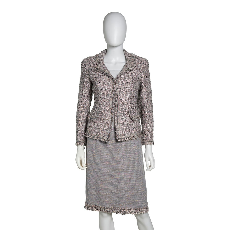 CHANEL: PINK AND GREY BOUCLE TWEED SKIRT SUIT ENSEMBLE Fall 2004: CHANEL: PINK AND GREY BOUCLE TWEED SKIRT SUIT ENSEMBLE Fall 2004 • Multicolor Boucle Tweed Exterior • Grey Sequin Embellishments Along Jacket Trim • Jacket Hook and Eye Closure | Zip