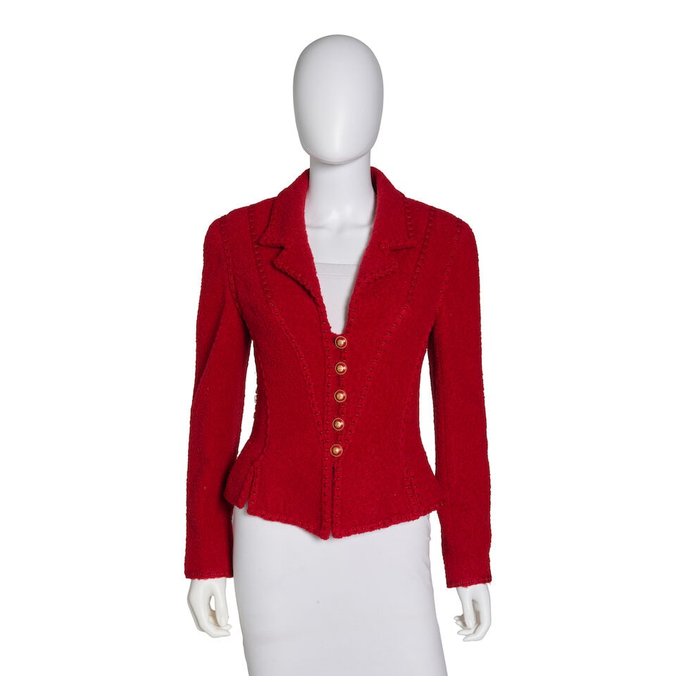 CHANEL: RED WOOL EVENING JACKET Fall 1993: CHANEL: RED WOOL EVENING JACKET Fall 1993 • Red Wool Blend Exterior • Tonal Reverse Stitching Along Panels • CC Button Closure • Double Vent Detailing Along Bottom Hems •