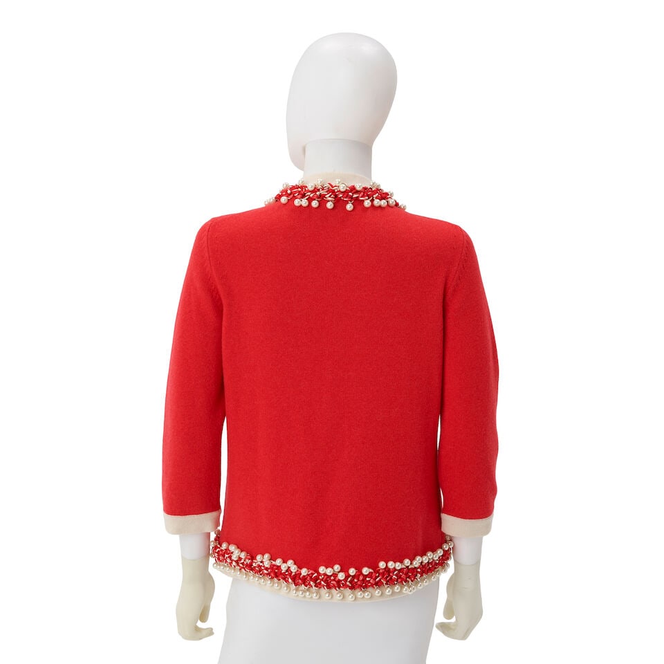 CHANEL: RED CASHMERE SWEATER WITH PEARL AND ROPE TRIM Spring 2010 - 2