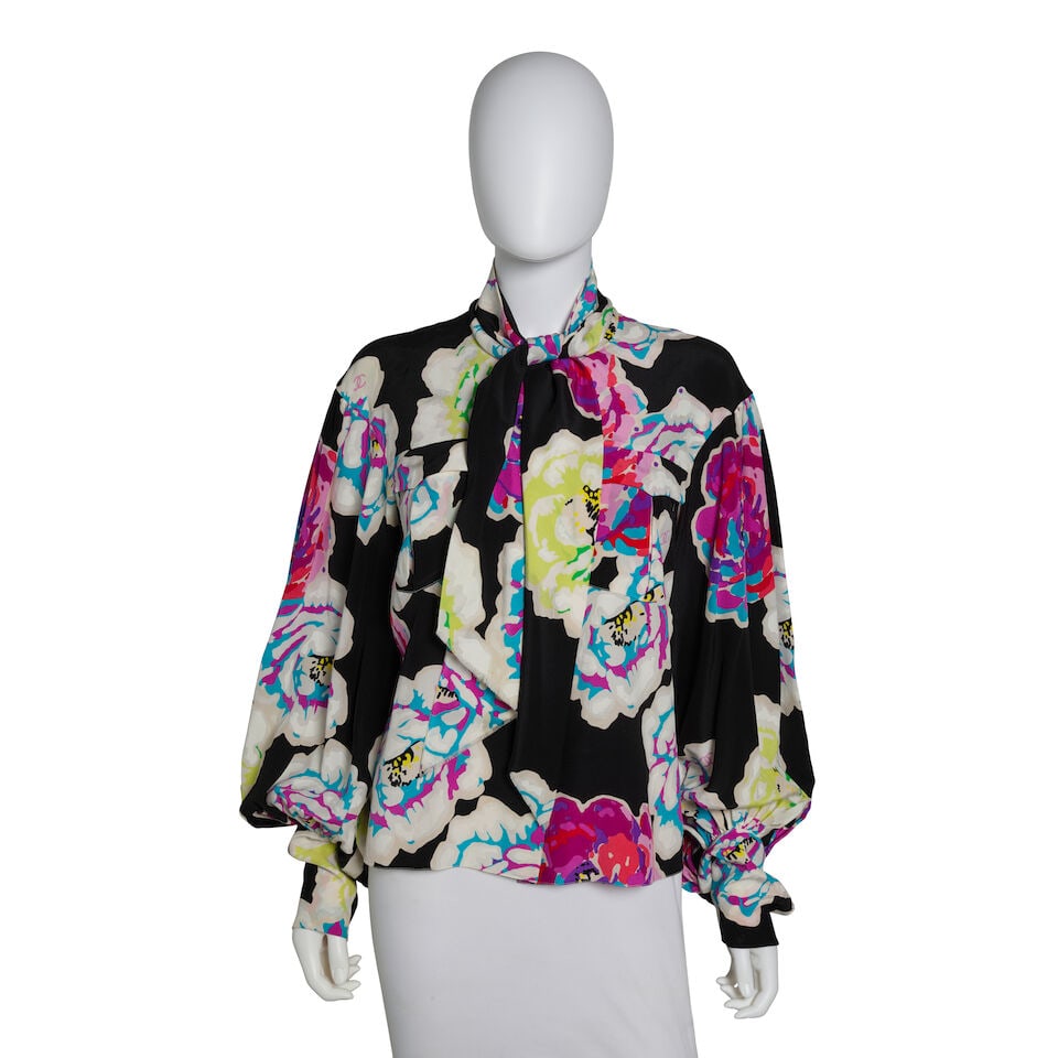 CHANEL: MULTICOLOR CAMELLIA PRINT SILK BLOUSE Spring 2011 | Look 46: CHANEL: MULTICOLOR CAMELLIA PRINT SILK BLOUSE Spring 2011 | Look 46 • Multicolor Color Camellia Print Silk Exterior • Necktie Detail with Raw Edge • Button Closure • Pleated Ba