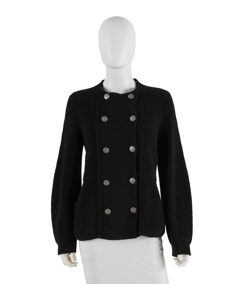 CHANEL: BLACK CASHMERE DOUBLE BREASTED CARDIGAN Pre Fall 2016: CHANEL: BLACK CASHMERE DOUBLE BREASTED CARDIGAN Pre Fall 2016 • Marked Size 36 • Black Cashmere Exterior • Double Breasted Logo Button Closure • Pockets at Bust and Waist For f
