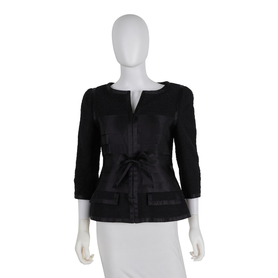 CHANEL: BLACK TWEED PANELED RIBBON EVENING JACKET Fall 2006 | Look 32: CHANEL: BLACK TWEED PANELED RIBBON EVENING JACKET Fall 2006 | Look 32 • Black Tweed and Paneled Ribbon Exterior • Black Ribbon Waist Belt • Zipper Closure • Cropped Sleeves 