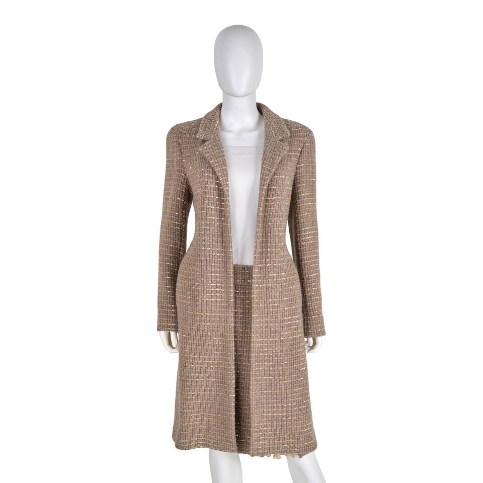 CHANEL: BEIGE TWEED EMBELLISHED SKIRT SUIT ENSEMBLE Fall 2000 | Look 14: CHANEL: BEIGE TWEED EMBELLISHED SKIRT SUIT ENSEMBLE Fall 2000 | Look 14 • Beige and Grey Tweed Exterior with Sequin Embellishment Detail • Skirt Zipper Closure • Pleated Chiffon Inse