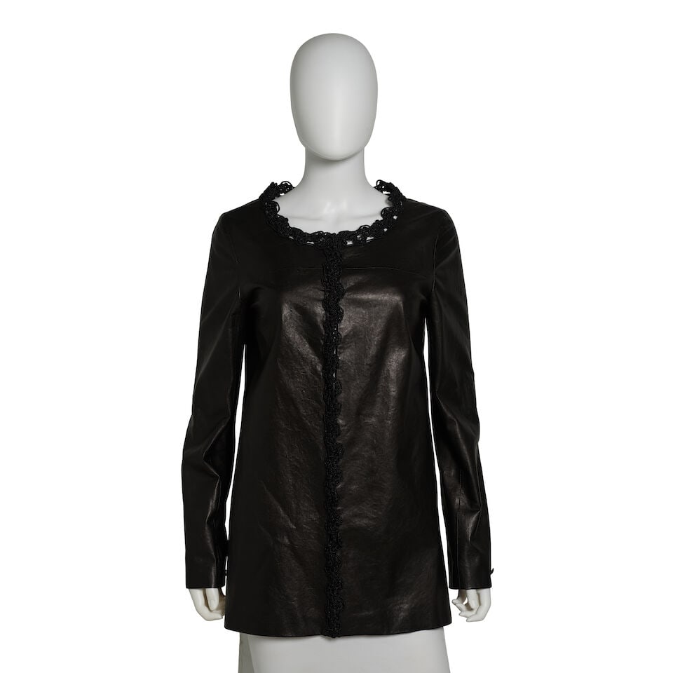 CHANEL: BLACK LEATHER JACKET WITH CROCHET TRIM Fall 2009: CHANEL: BLACK LEATHER JACKET WITH CROCHET TRIM Fall 2009 • Leather Exterior • Black Crochet Trim Detail • Hook Eye Closure • CC Black Bead Detail on Left Cuff • Black Sil